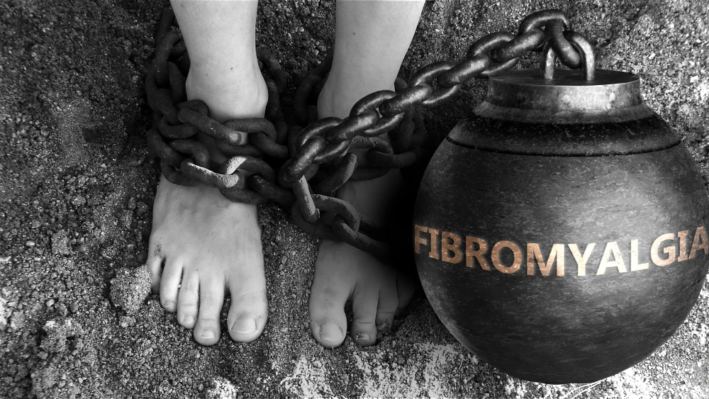 Fibromyalgia ball and chain around feet